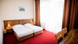 Отель Hotel Piast Слупск Двухместный номер с 1 кроватью или 2 отдельными кроватями-1